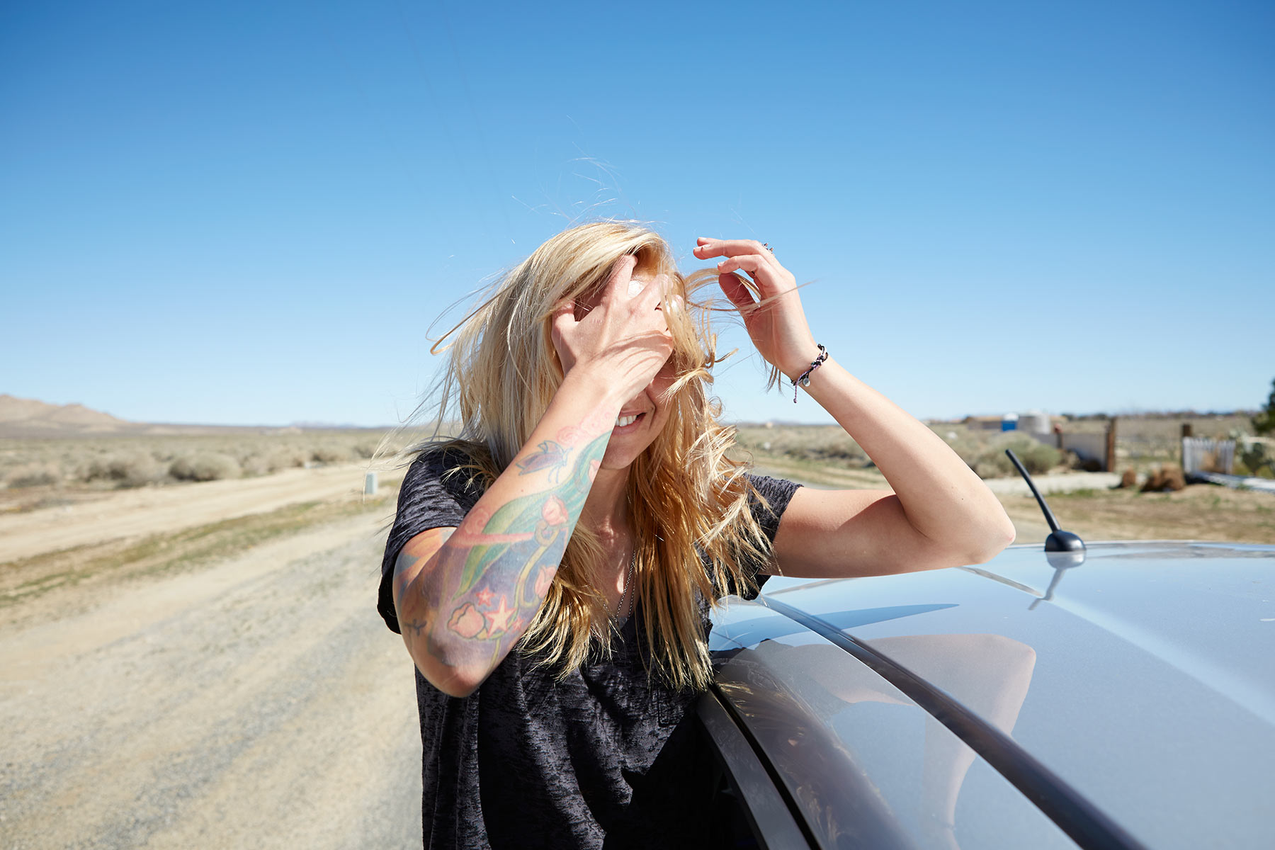 Desert_Lifestyle_Advertising_Photographer_LA_Los_Angeles_Chicago_Advertising_Commercial_Photographer_Woman_Girl_Youth_Culther_Out_Car_Window_Wind_in_Hair_Fun_Blowing_Mike_Henry