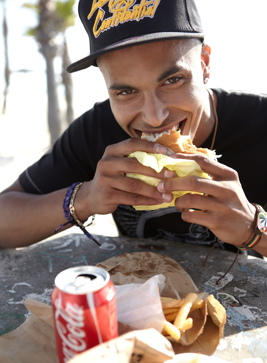 Edgy_Lifestyle_Photographery_Real_Lifestyle_Photography_Advertising_Mike_Henry_Los_Angeles_African_American_Male_Black_Guy_Eating_Cheeseburger