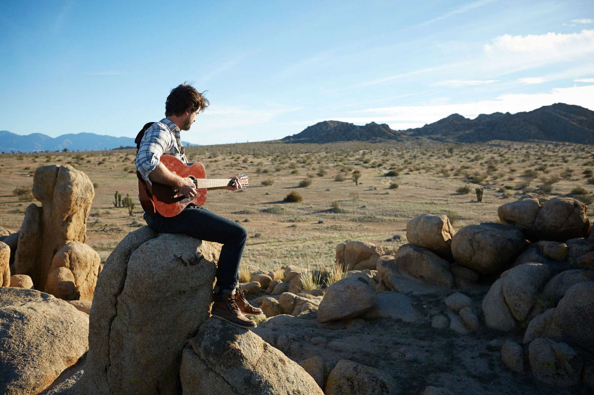 desert_Lifestyle_Advertising_Photographer_Chicago_Los_Angeles_Man_Hipster_Millenial_Playing_Guitar_Desert_Landscape_Mike_Henry_Photo